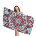 Ethnic Mandala geometric beach towel featuring vibrant red and blue patterns held by a model - Navy Red Mandala (5)