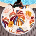 Round beach towel with tropical monstera leaves and white tassels on pool deck - Colorful Monstera and Hibiscus Style