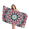 Ethnic Mandala geometric beach towel in red and navy blue held by a model - Vintage Blue Red Mandala (8)