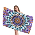 Thick beach towel with purple and orange mandala geometric patterns held by a model - Mandala Print 7