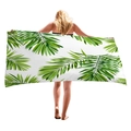 Thick beach towel featuring vibrant green tropical palm leaf prints on white background - 150x75cm / Tropical Palm Leaves Style (1)