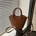 Vintage brown leather bucket bag with top handles and adjustable shoulder strap for women - Brown