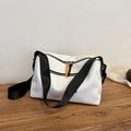 Minimalist white nylon messenger bag with black wide strap and orange zipper detail - White