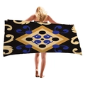 Ethnic geometric beach towel in black gold and blue pattern shown from the back - Black Gold Blue Ethnic Symmetrical (6)
