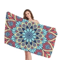 Mandala geometric pattern beach towel held by model featuring vibrant blue and red tones - Multicolor Exotic Mandala (15)