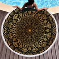 Circular black and gold mandala beach towel with white tassels on a pool deck - Black Base Gold Pattern Mandala (6)