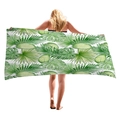 Thick cotton beach towel featuring vibrant green tropical monstera leaf patterns - 150x75cm / Jungle Green and White Dense Print (11)