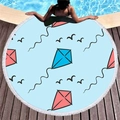 Round blue beach towel with kite print and white tassels on pool wood deck - Kite and Sea Bird Style (11)
