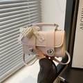 Pink Cambridge pillow handbag with pearl heart, lace bow, and silver twist locks - With Pendant / Pink