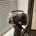 Chic black leather handbag with silver twist locks, lace bow and pearl decoration - With Pendant / Black