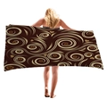 Thick beach towel with brown geometric spiral and floral patterns shown by model - Dark Brown Retro Spiral Pattern Style (6)
