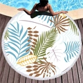 Round tropical leaf beach towel with white tassels on a poolside wooden deck - Colorful Tropical Leaves Style (7)