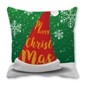 Détail d'une housse de coussin de Noël avec bonnet rouge et texte festif doré - Modèle de Bonnet de Père Noël Rouge sur Fond de Reflet Flou Vert (39) / 45x45cm
