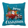 Détail de la taie d'oreiller de Noël sarcelle avec le Père Noël dans un camion rouge - Modèle de Camion Rouge et Père Noël sur Fond Bleu Paon (34) / 45x45cm