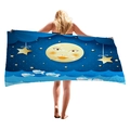 Thick beach towel with moon and stars cartoon pattern held by a blonde model - Playful Moon and Clouds (6)