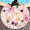 Round floral beach towel with pink roses and white tassels on wooden deck by a pool - Realistic Pink Rose Green Leaves