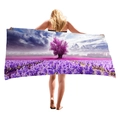Microfiber beach towel featuring a purple lavender field landscape print being held by a model - Lavender Purple Flower Tree (1)