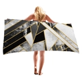 Thick beach towel with geometric black, white marble, and gold lines, model view - Black White Marble Art (6)