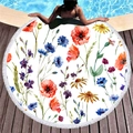 Round floral beach towel with white tassels and colorful poppies on poolside wood deck - Colorful Poppy Cornflower