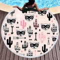 Pink round beach towel with raccoon and cactus patterns featuring white fringe tassels - Nordic Raccoon Cactus