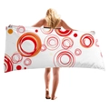 Thick beach towel with red and orange geometric circle patterns shown from the back view - White Orange Red Polka Dots (10)