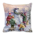 Close-up of peach skin fabric cushion cover with artistic winter scene of kids and snowman - Winter Snow Childhood Fun Style (25)