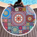 Bohemian mandala round beach towel with white tassels on a wooden pool deck - Multi-color Mandala Pattern (1)