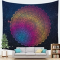 Detailed starry galaxy mandala tapestry hanging as a backdrop in a modern living room - Starry Pink-Yellow Mandala (8)