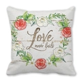 Kerst kussensloop met rozenkrans en Love never fails citaat op zachte perzikhuid textuur - Love Never Fails Bloemenring (30)