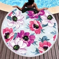 Round floral beach towel with pink flower print and white tassel fringe on wooden deck - Pink & Purple Floral (6)