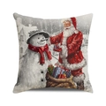 Dettaglio del tessuto in lino della federa con stampa natalizia stile pittura a olio - Motivo Babbo Natale e Pupazzo di Neve (2)