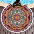 Mandala pattern round beach towel with white tassels on a poolside wooden terrace - Exotic Purple Red Mandala (9)