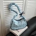 Light blue pleated shoulder bag with black bow patterns and cloud-style handle strap - Blue