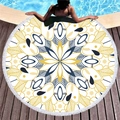 Round mandala beach towel with navy and yellow fringe, laying on a pool deck - Blue Yellow Geometric Mandala (10)