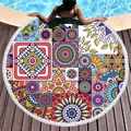 Mandala pattern round beach towel with white tassels on a wooden poolside deck - Ethnic Patchwork Mandala (12)