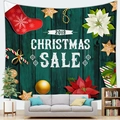 Close-up of festive Christmas tapestry with red stockings and gingerbread patterns - Green Wood Grain Christmas Sale