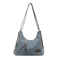 Blue and white chevron pattern straw hobo bag with brown leather strap and side zipper - Blue