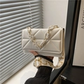Fashionable white quilted square bag with chunky resin chain and patterned shoulder strap - White