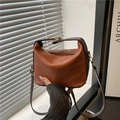 Brown pleated vertical striped crossbody bag with contrasting texture and gold hardware - Brown