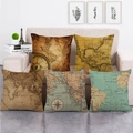 Set of 5 vintage nautical world map decorative cushion covers on a white sofa - Vintage Nautical Map Compass Style 9