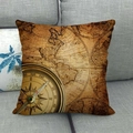 Vintage nautical world map and compass print cushion cover on a grey sofa - Vintage Nautical Map Compass Style 1