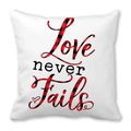 White square pillow cover featuring Love Never Fails print in red buffalo plaid - Love Never Fails Artistic Script Style