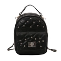 Quilted black mini backpack with rhinestone decor and silver chain strap on white background - Black
