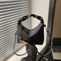 Fashionable black pleated crossbody bag with a trendy ruched handle and shoulder strap - Black
