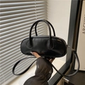 Minimalist black patent leather baguette bag with dual handles and slim shoulder strap - Black