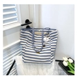 Blue and white striped canvas tote bag with a white plush charm and long shoulder straps - With Plush Charm / Blue