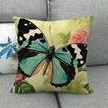 Linen pillowcase featuring a vintage teal butterfly and pink rose print on gray sofa - Teal Blue Butterfly Style (2)