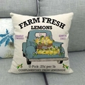 Λινή μαξιλαροθήκη Farm Fresh Lemons με vintage μπλε φορτηγό σε γκρι καναπέ σπιτιού - Φορτηγό Με Φρέσκα Λεμόνια (5) / 45x45cm