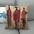 Detailed close-up of African ethnic style cushion cover on a gray fabric sofa - Earth Tone Abstract Style (15) / 45x45cm