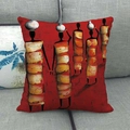 Detail of African ethnic style pillow cover featuring woman silhouettes on a gray sofa - Vermilion Women Silhouette Style (8) / 45x45cm